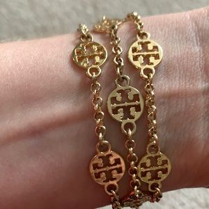 Tory Burch logo Triple strand gold bracket